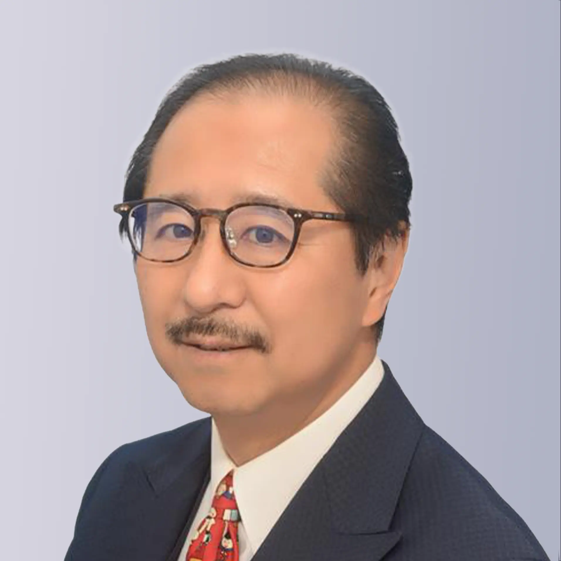 Two professionals shaking hands outdoors, symbolizing partnership and collaboration.