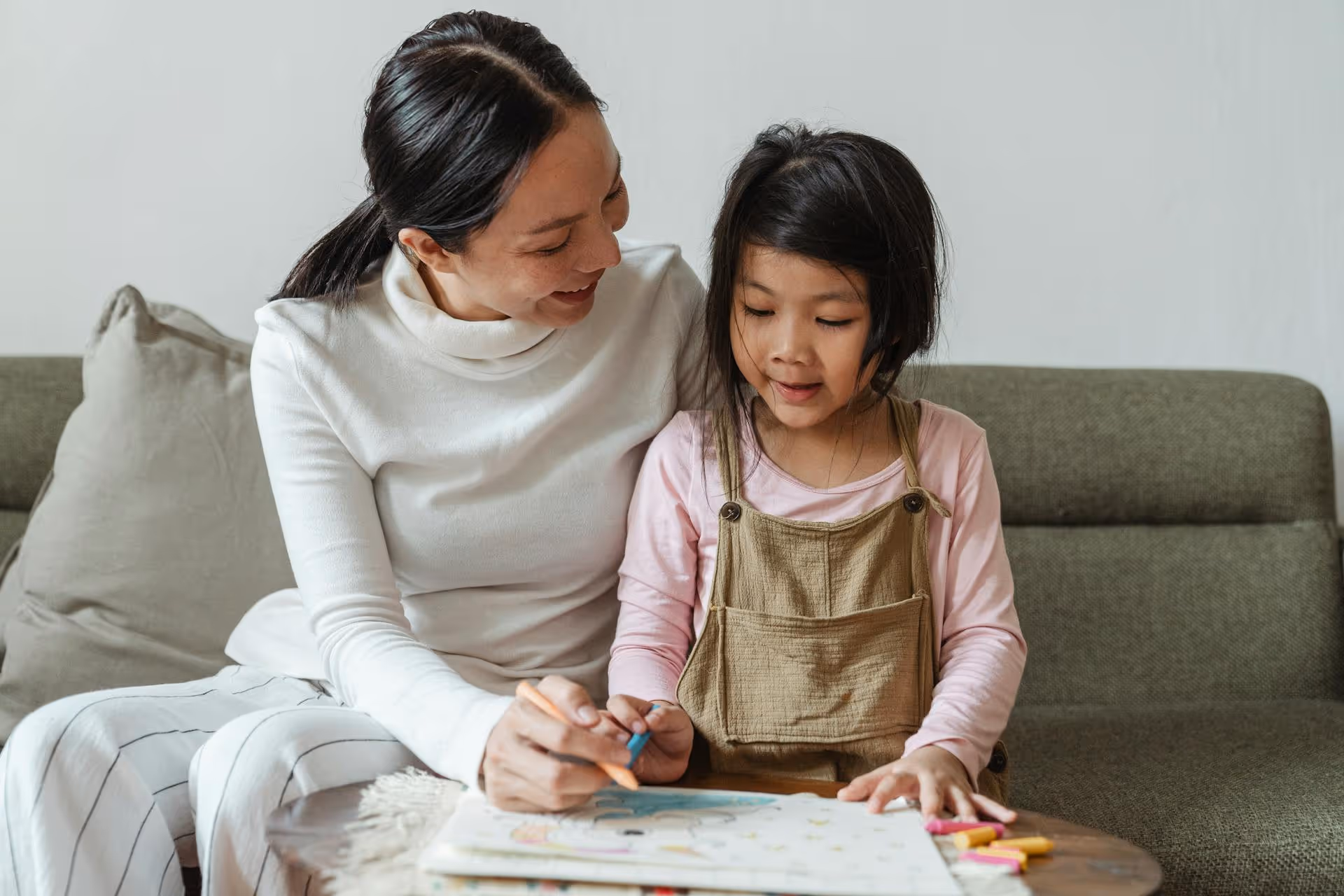 Elementary school student learning with a tutor