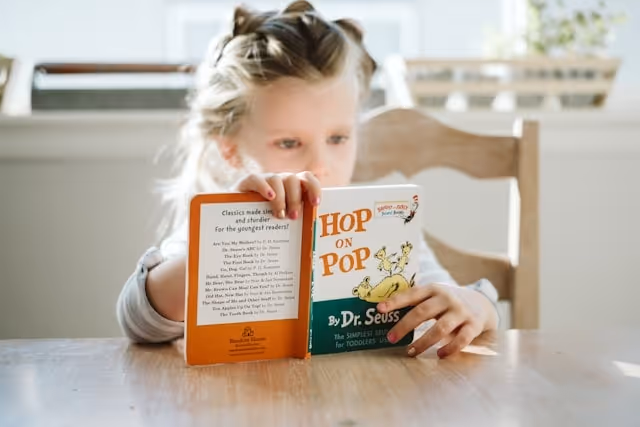 Young girl reading a book