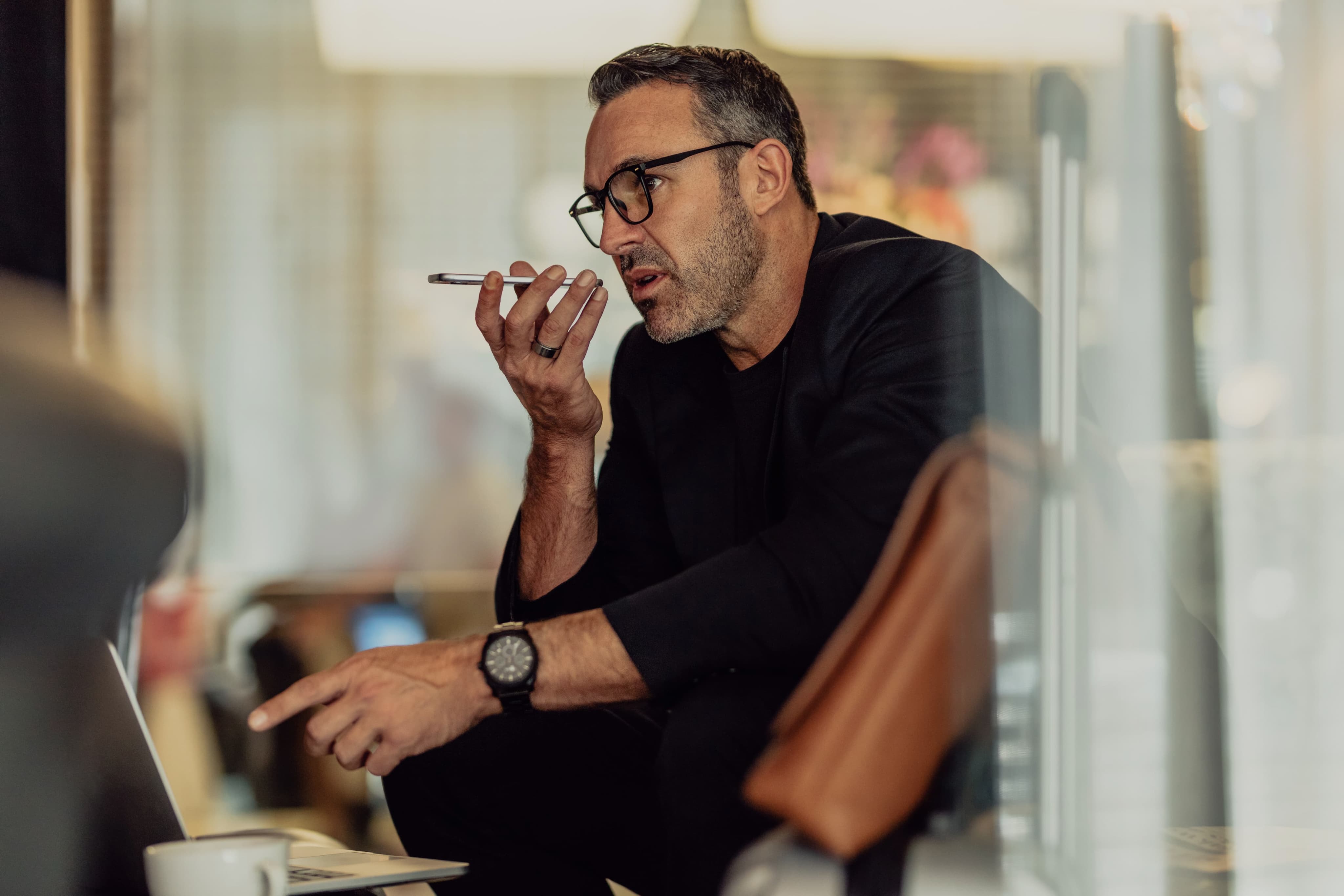 A man talking on the phone.