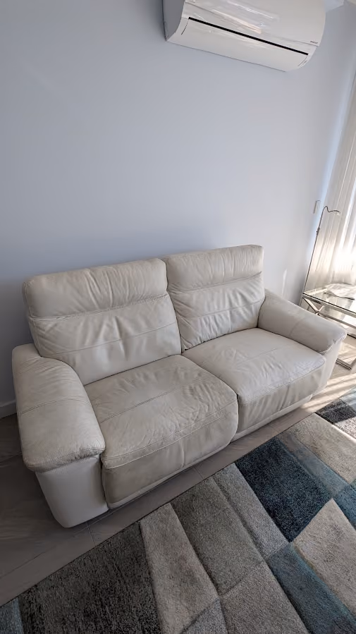 Leather lounge before cleaning