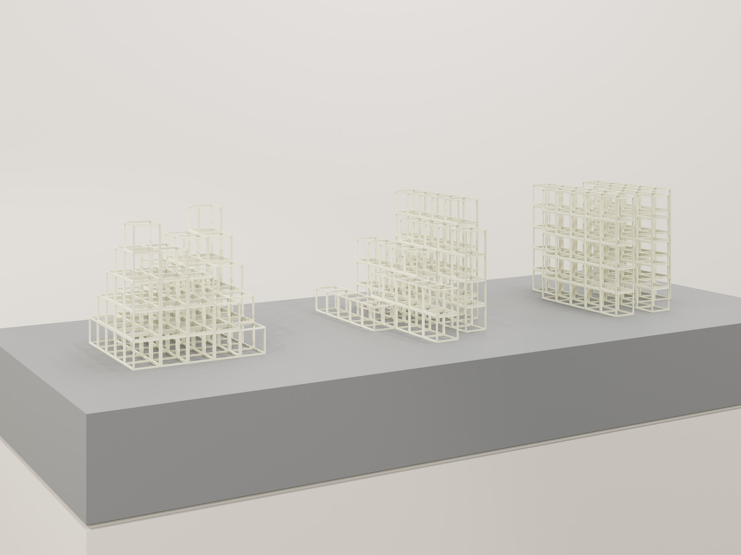 set of physical model studies showing formal variations and stacking logic within the modular system