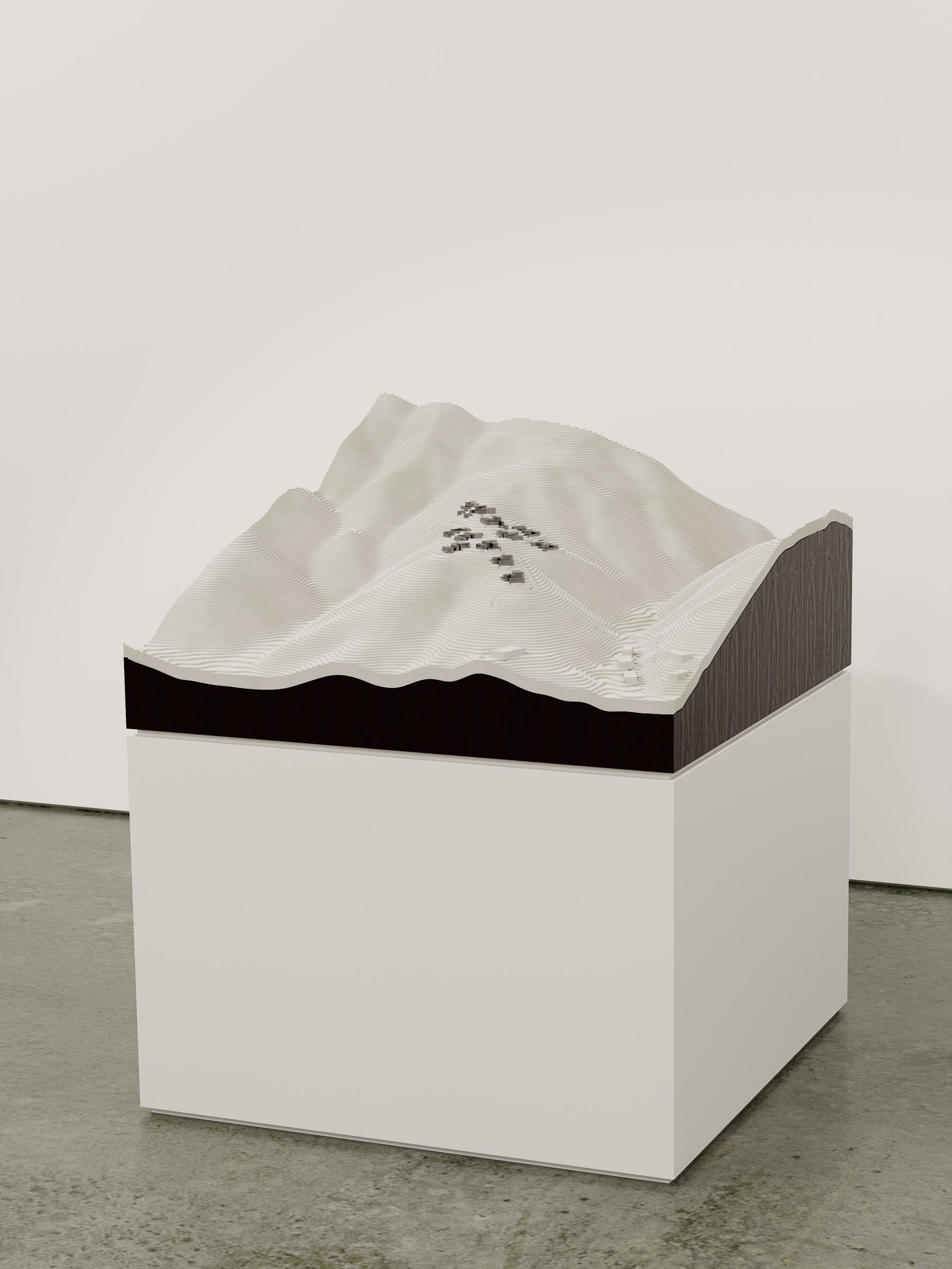 High-angle view of the 1:500 model emphasising terraced form and topographical layering.