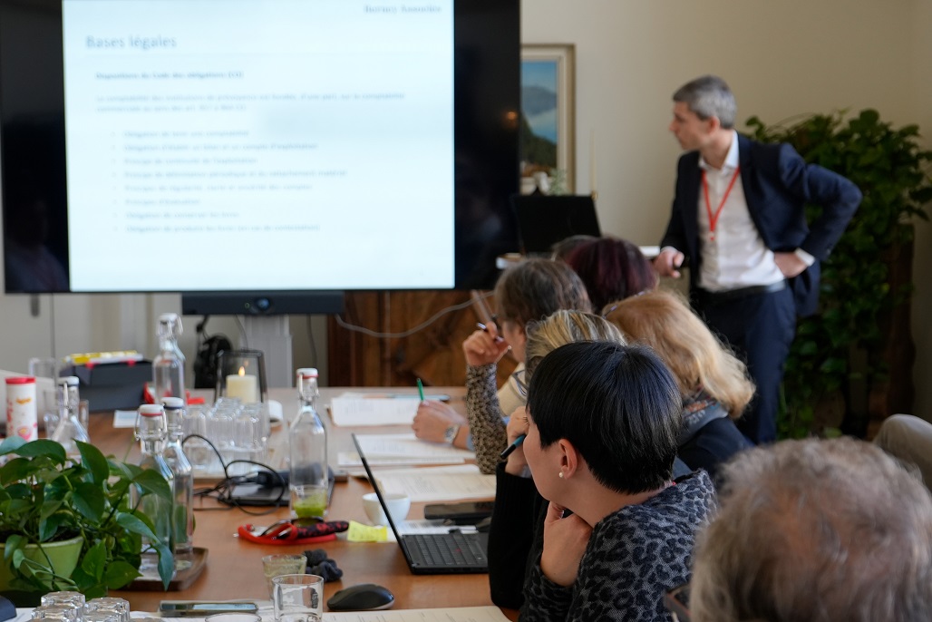 image of financial reports being reviewed