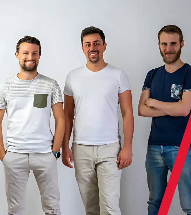 Photo des trois associés de HMT