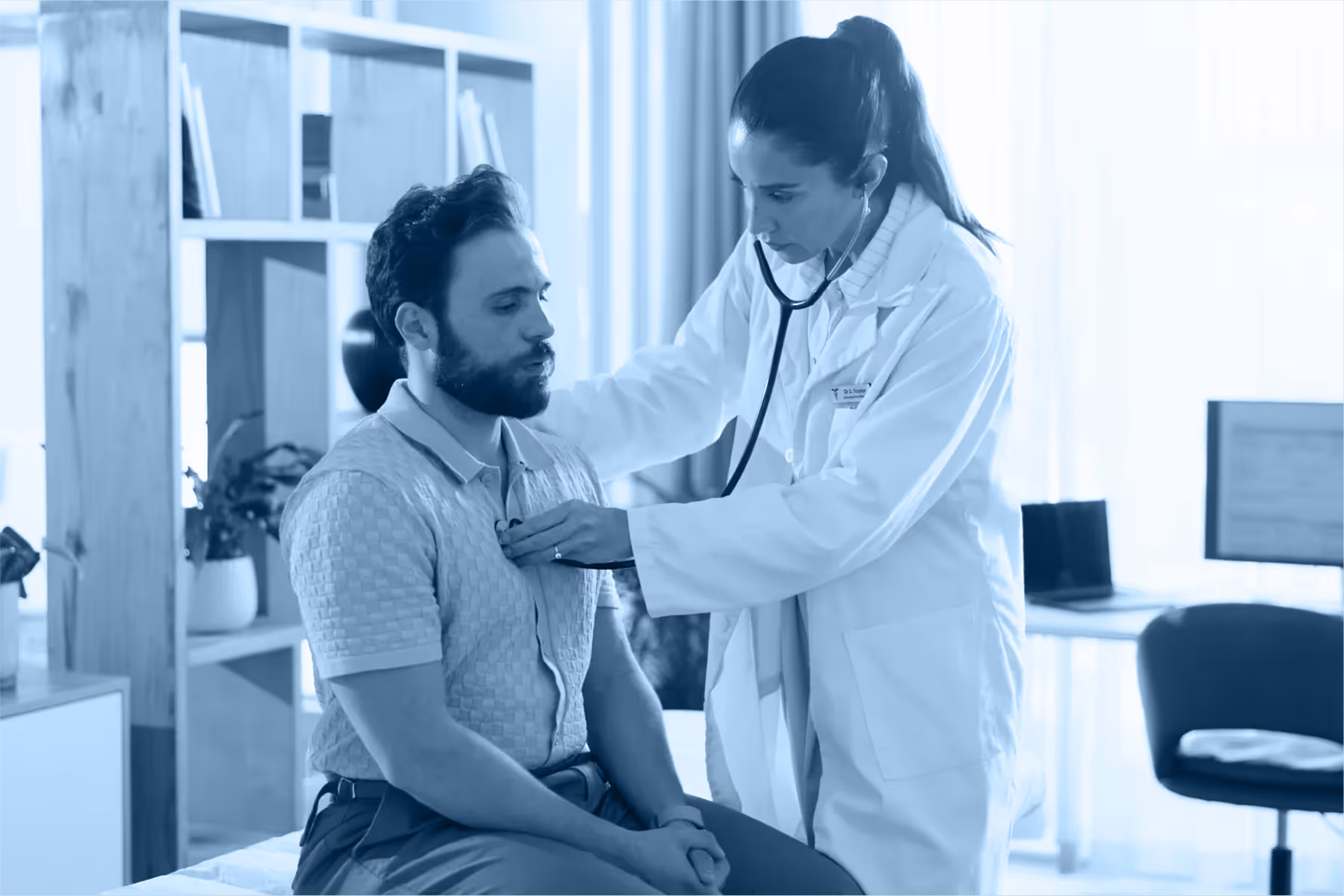 Man getting check up from doctor