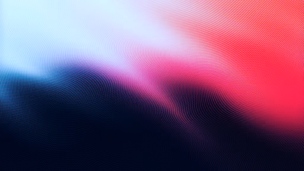 Abstract digital gradient background with vibrant red, pink, blue, and black colors blending in a textured wave pattern.