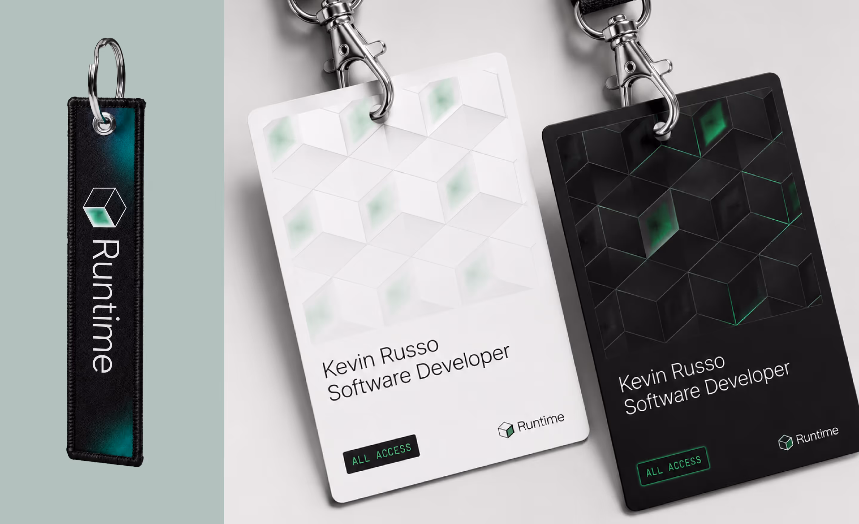 White and black ID badges with Kevin Russo, Software Developer, and Runtime logo, plus a Runtime keychain.