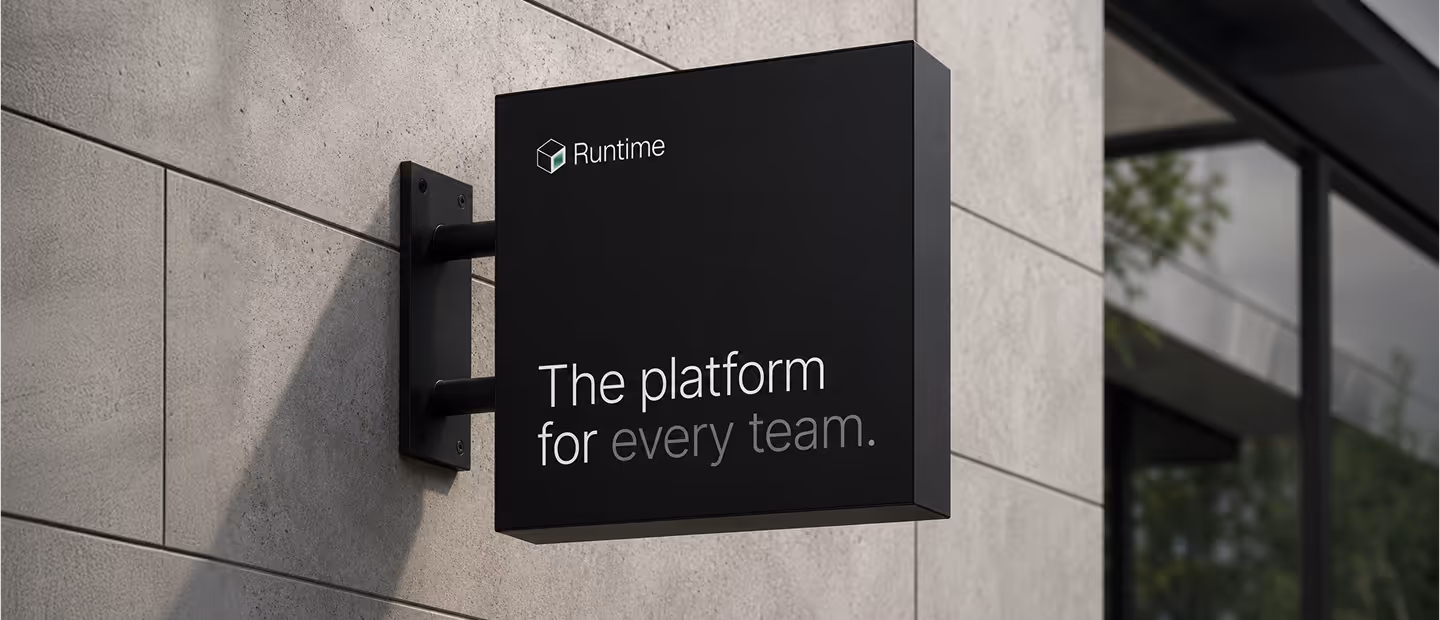 Black wall-mounted sign with Runtime logo and text 'The platform for every team.'