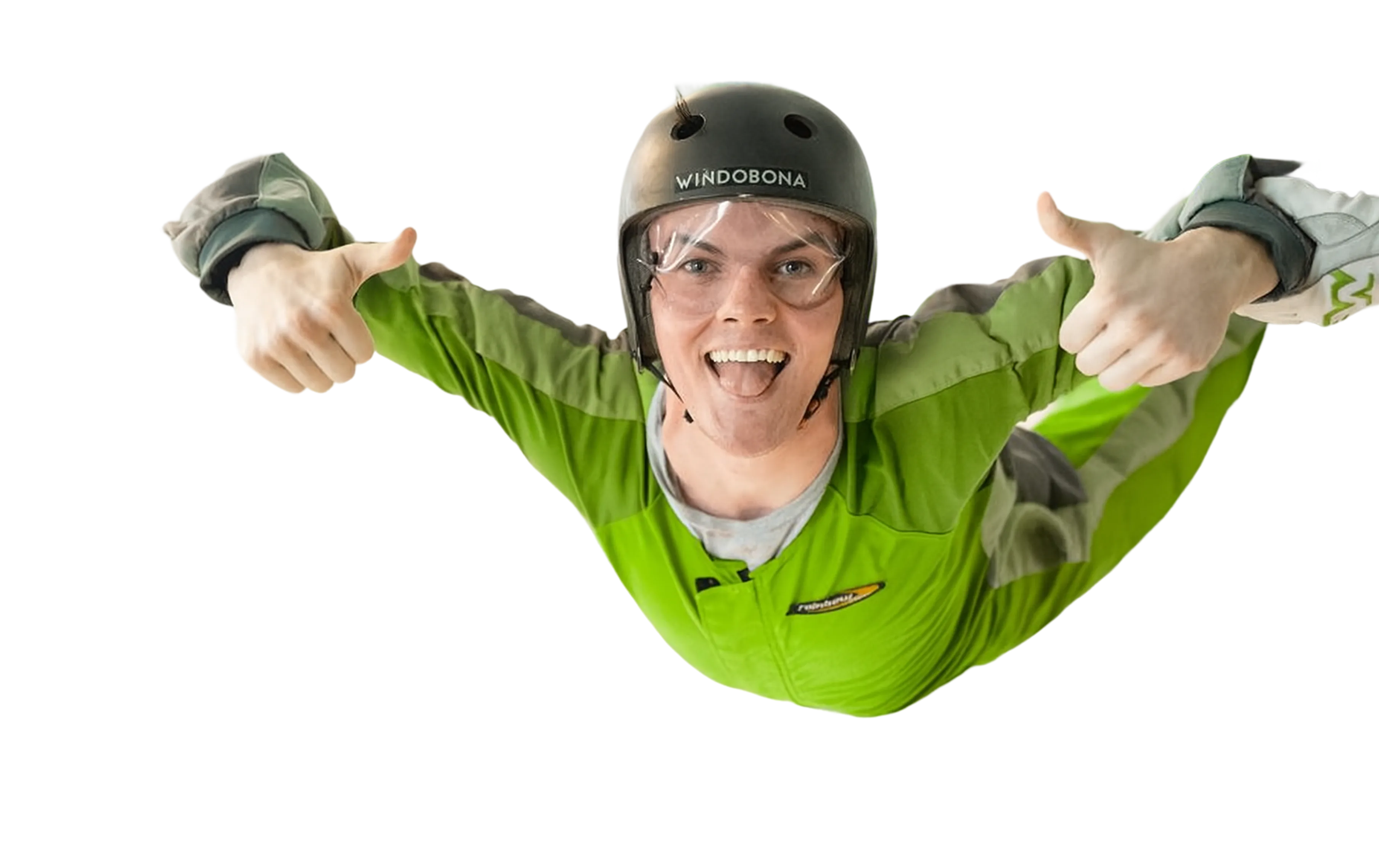 Young man in green flight suit giving thumbs up while flying.