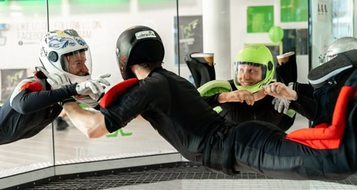 Group practicing formations in wind tunnel