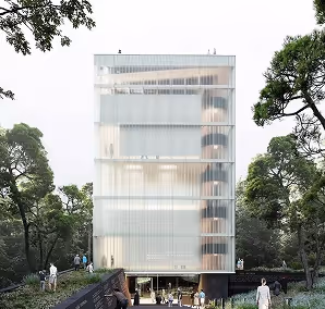 Modern glass building surrounded by trees with people walking around in a park-like setting.