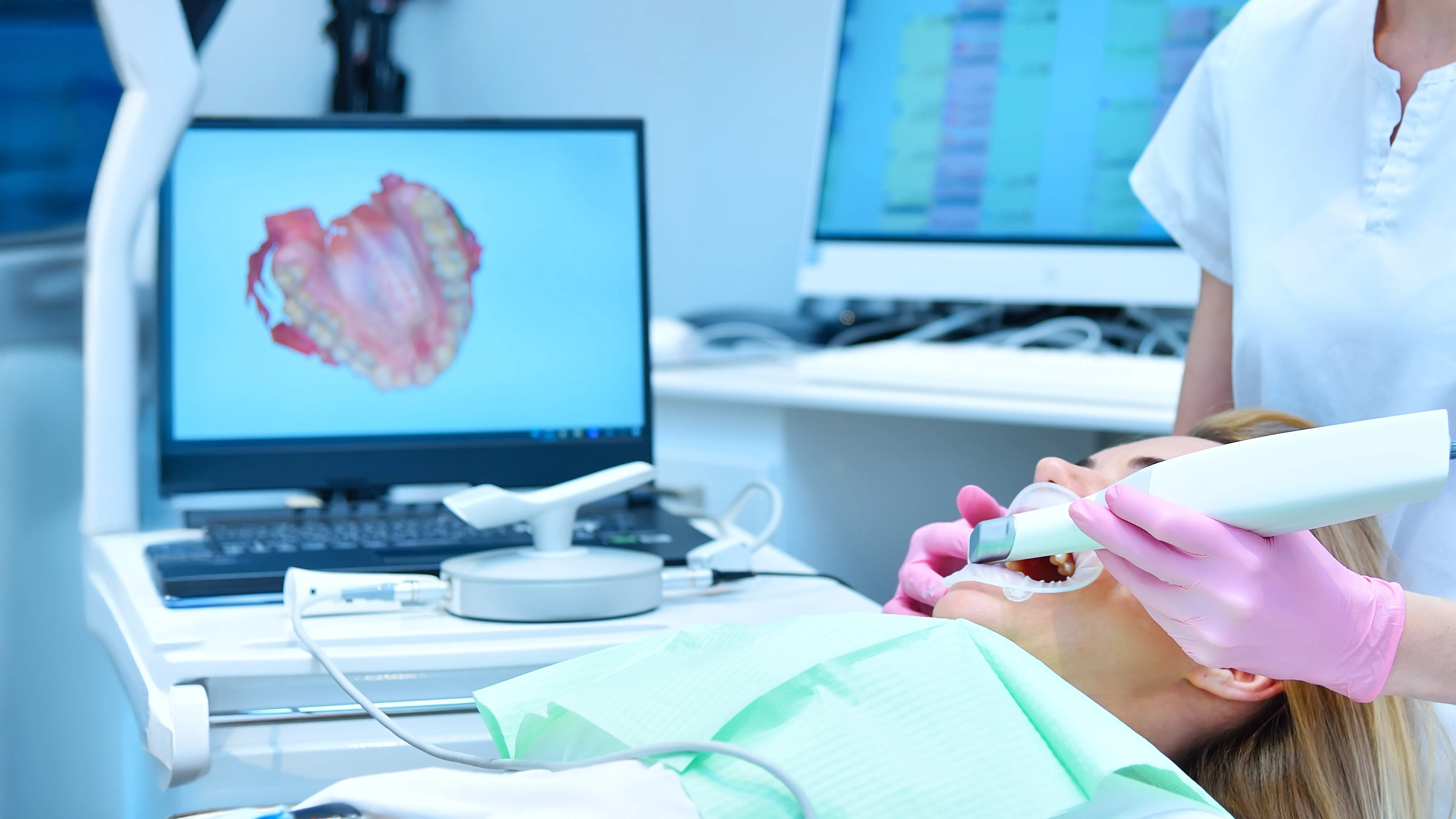 Dental scan of teeth displayed on computer screen during dental examination