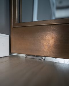 Bevestiging taatsdeur in vloer