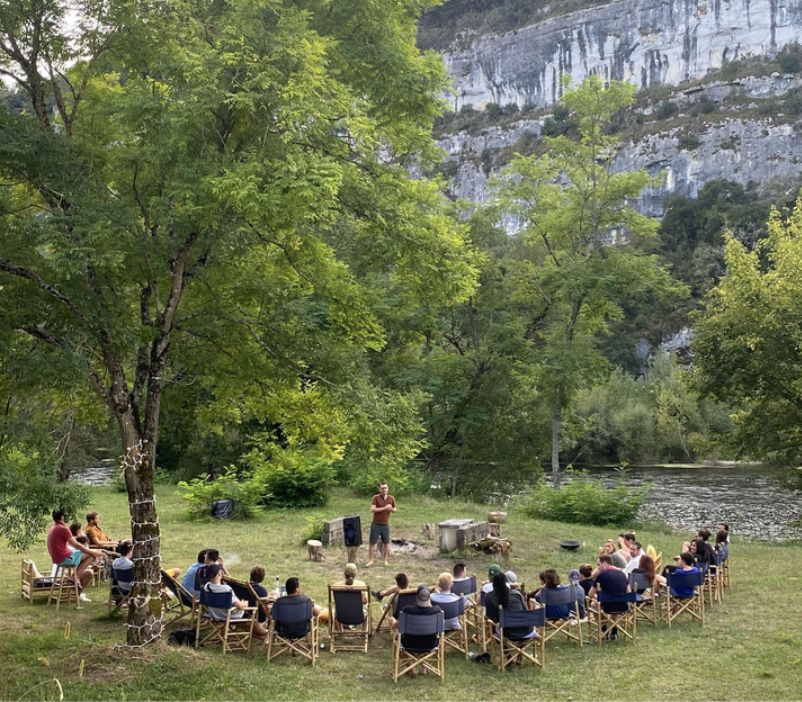 Chanel logo with two interlocking black Cs above the brand name.