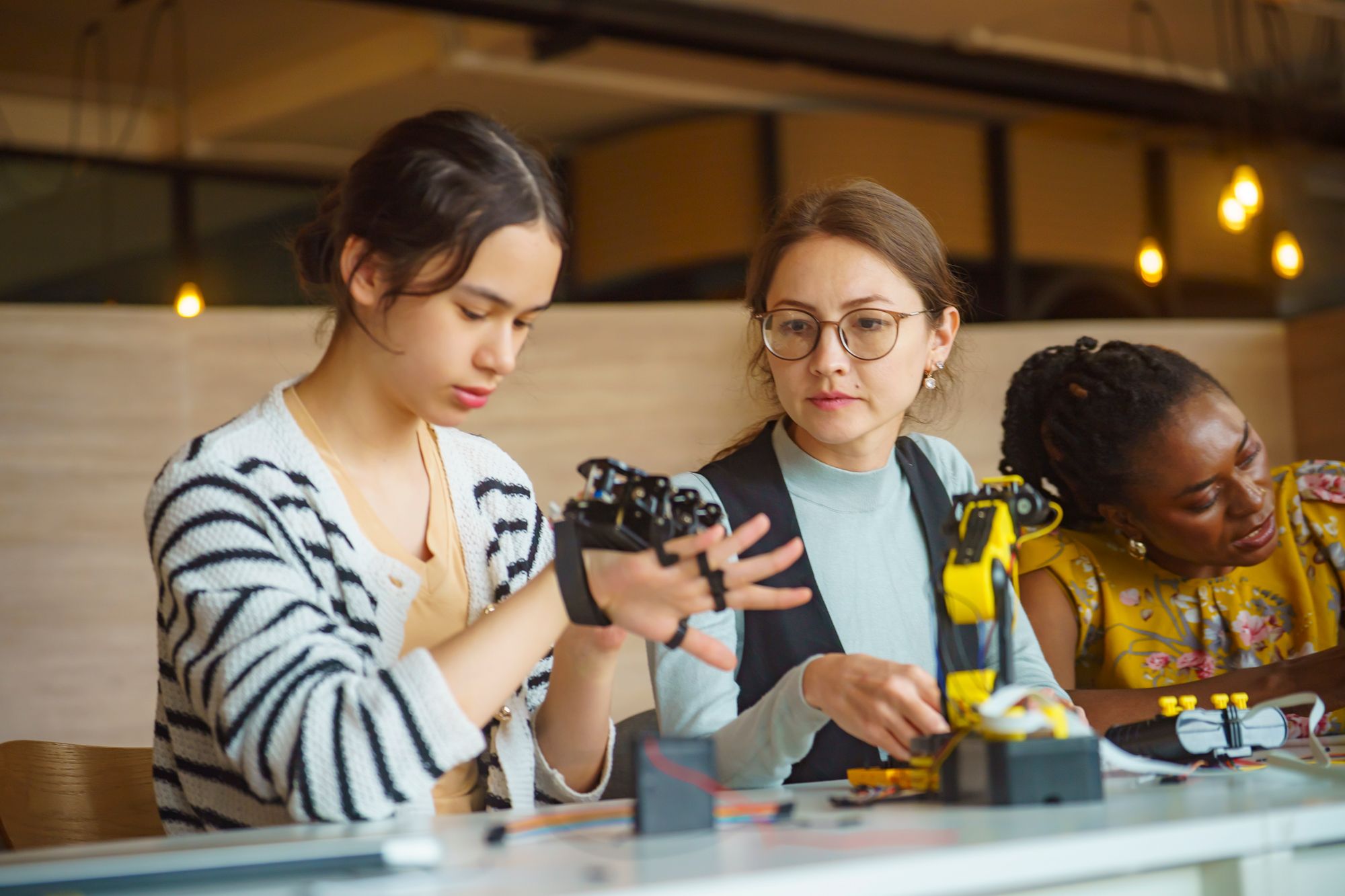 Young teen girl learning STEM at Young Leaders Academy in Brussels