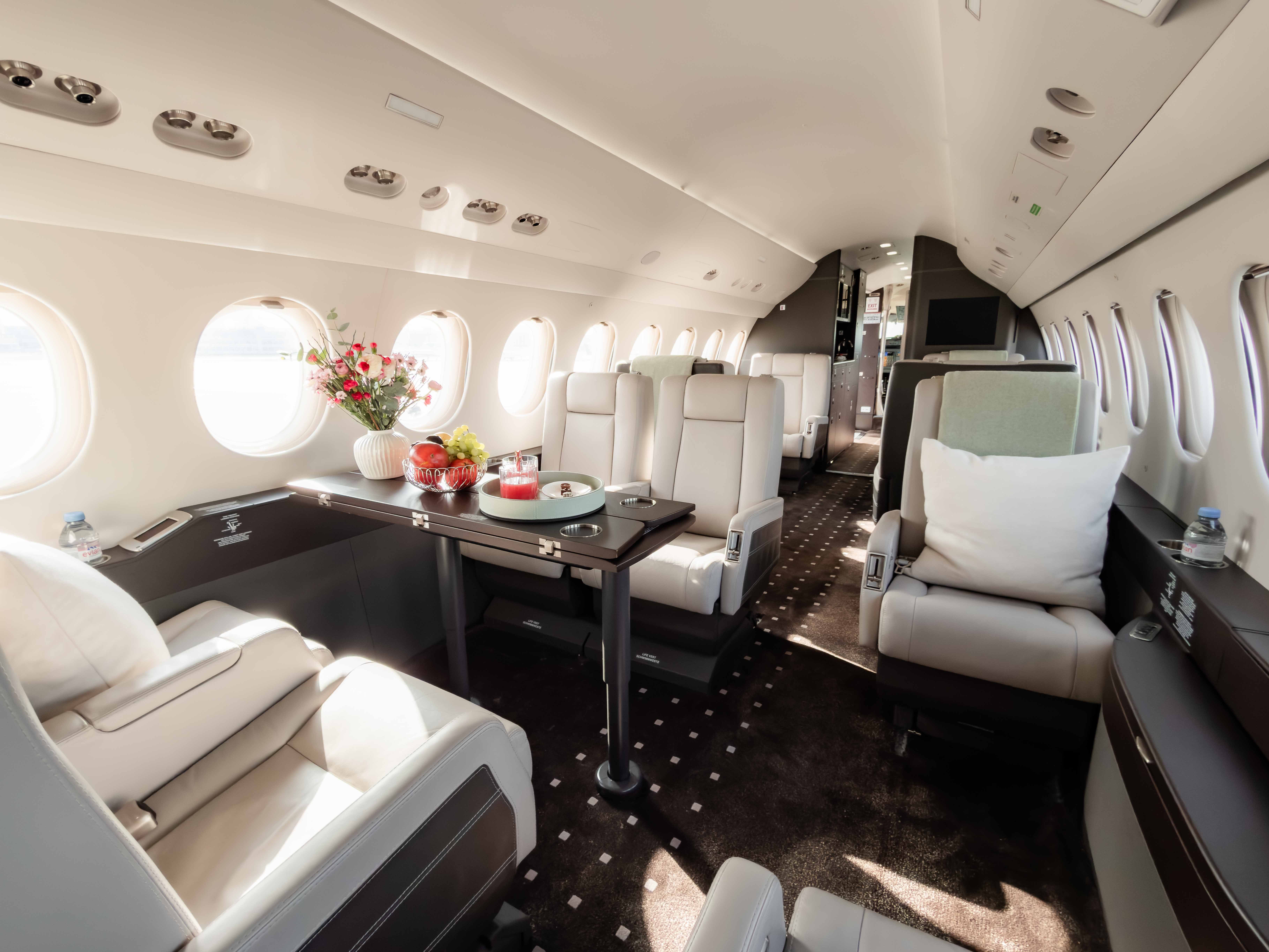 Welcome Setting with snacks and magazines on a planes seat