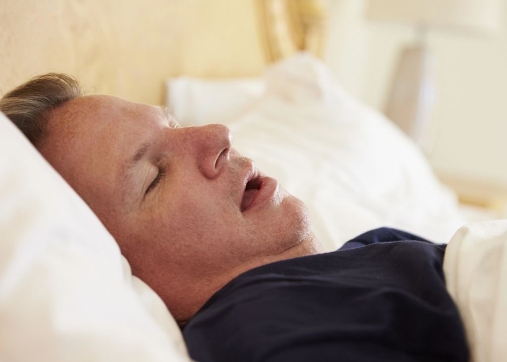 Man Snoring Sleep Clinic Lee's Summit - Accurso Aesthetics