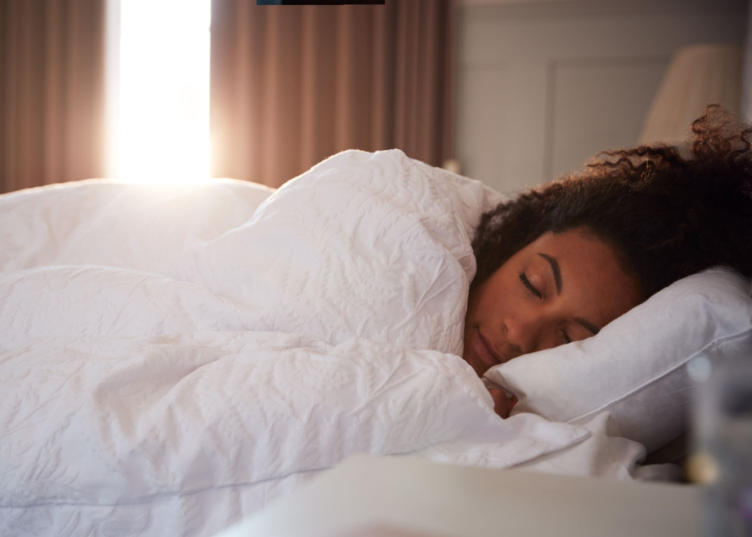 Woman Sleeping - NightLase Anti-Snoring Treatment in Lee's Summit: Wake Up Refreshed After a Peaceful Night's Sleep