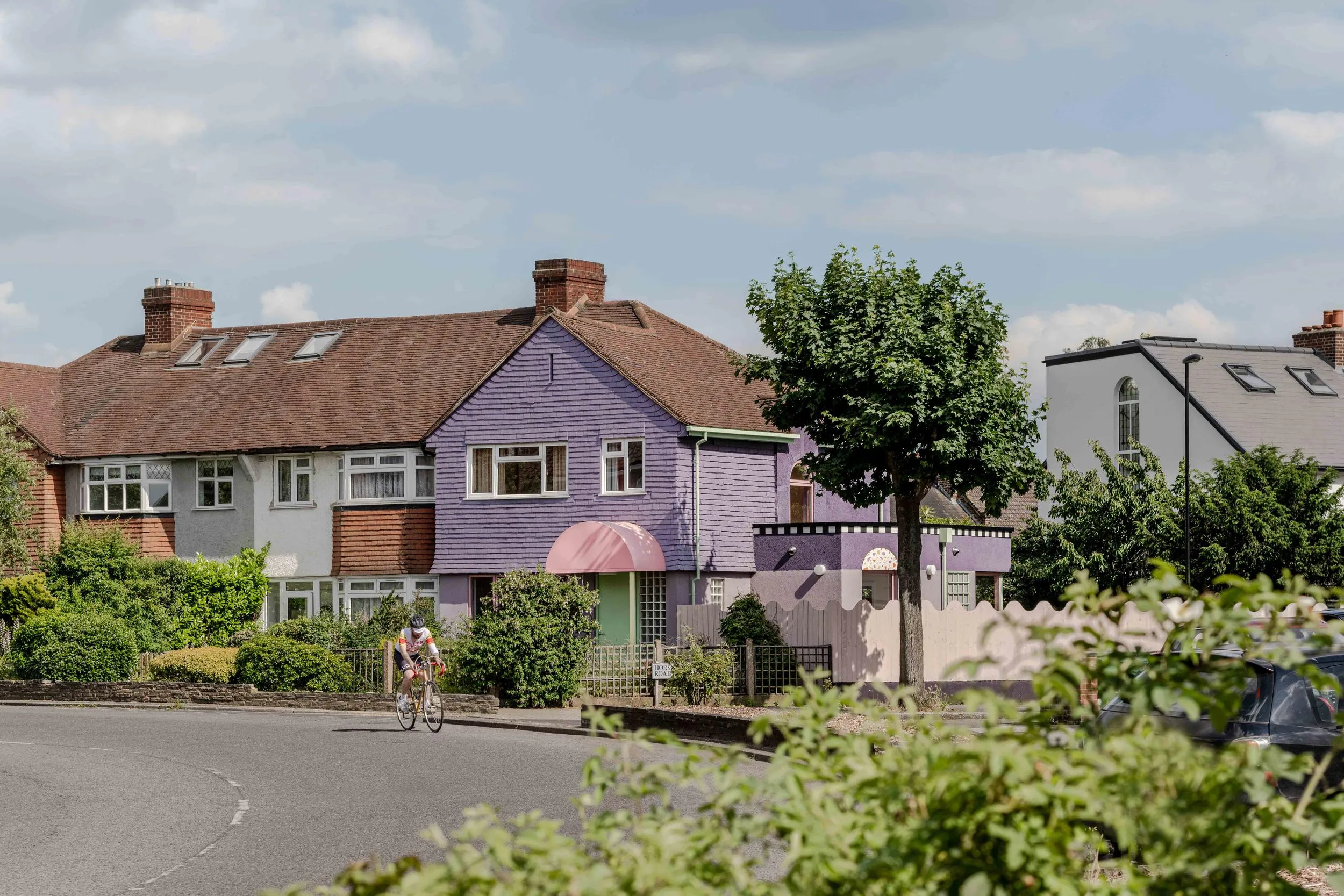 External photo of the project, Brockley House, with its distinctive purple facade. By Office S&M, RIBA Chartered Architectural Practice in London.