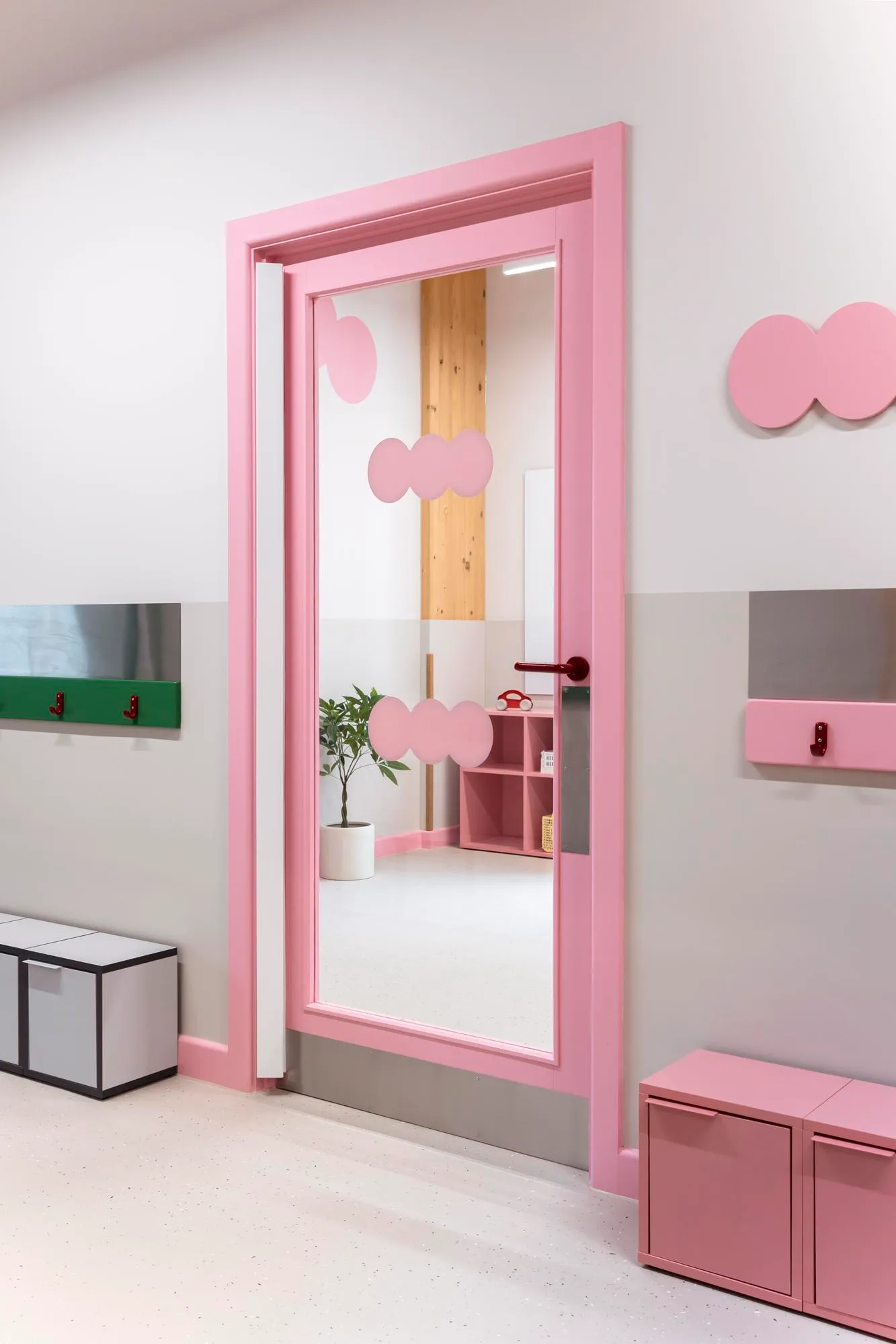 Photo of a doorway in pink. By Office S&M, RIBA Chartered Architectural Practice in London.