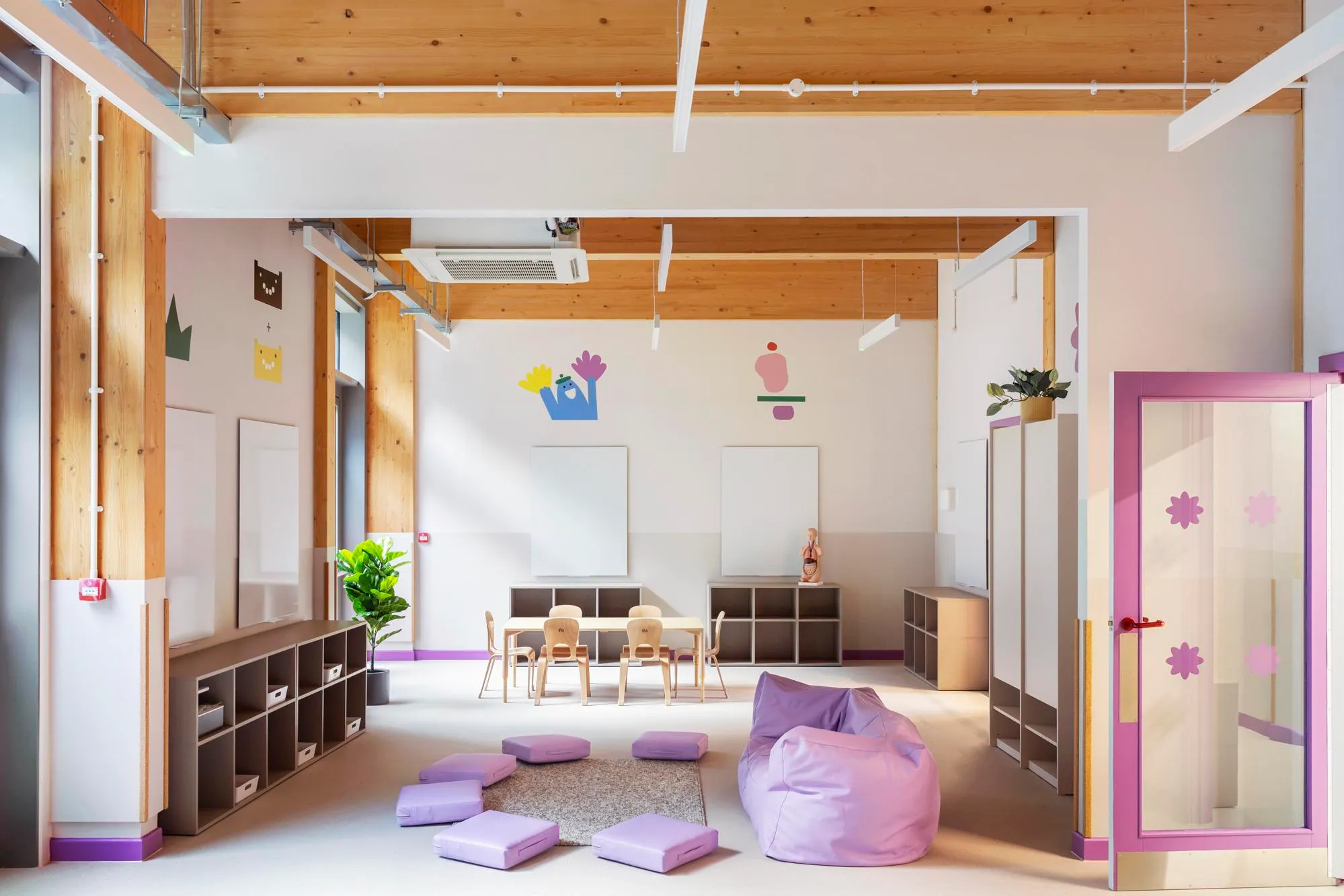 Photo of a purple nursery room, with timber structure. By Office S&M, RIBA Chartered Architectural Practice in London.