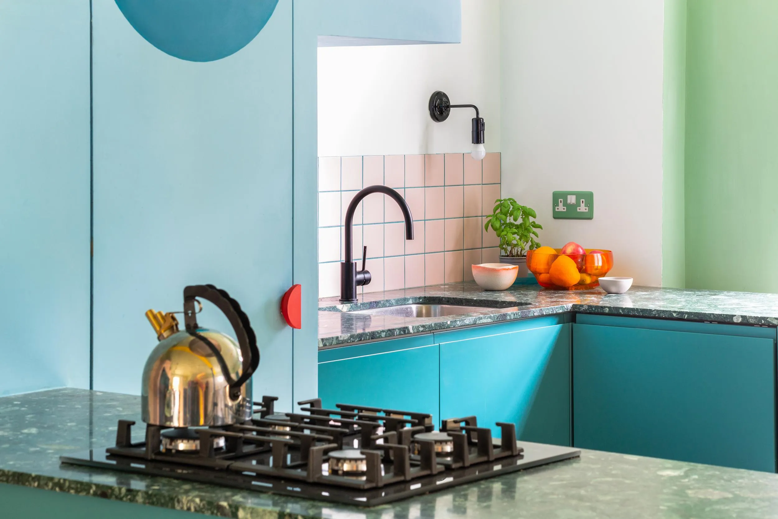 Photo of the kitchen view, showing the built-in hobs. By Office S&M, RIBA Chartered Architectural Practice in London.