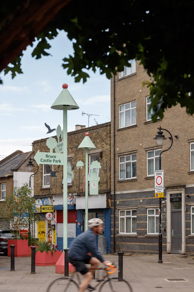Photo showing the wayfinding lamp post on the street. By Office S&M, RIBA Chartered Architectural Practice in London.