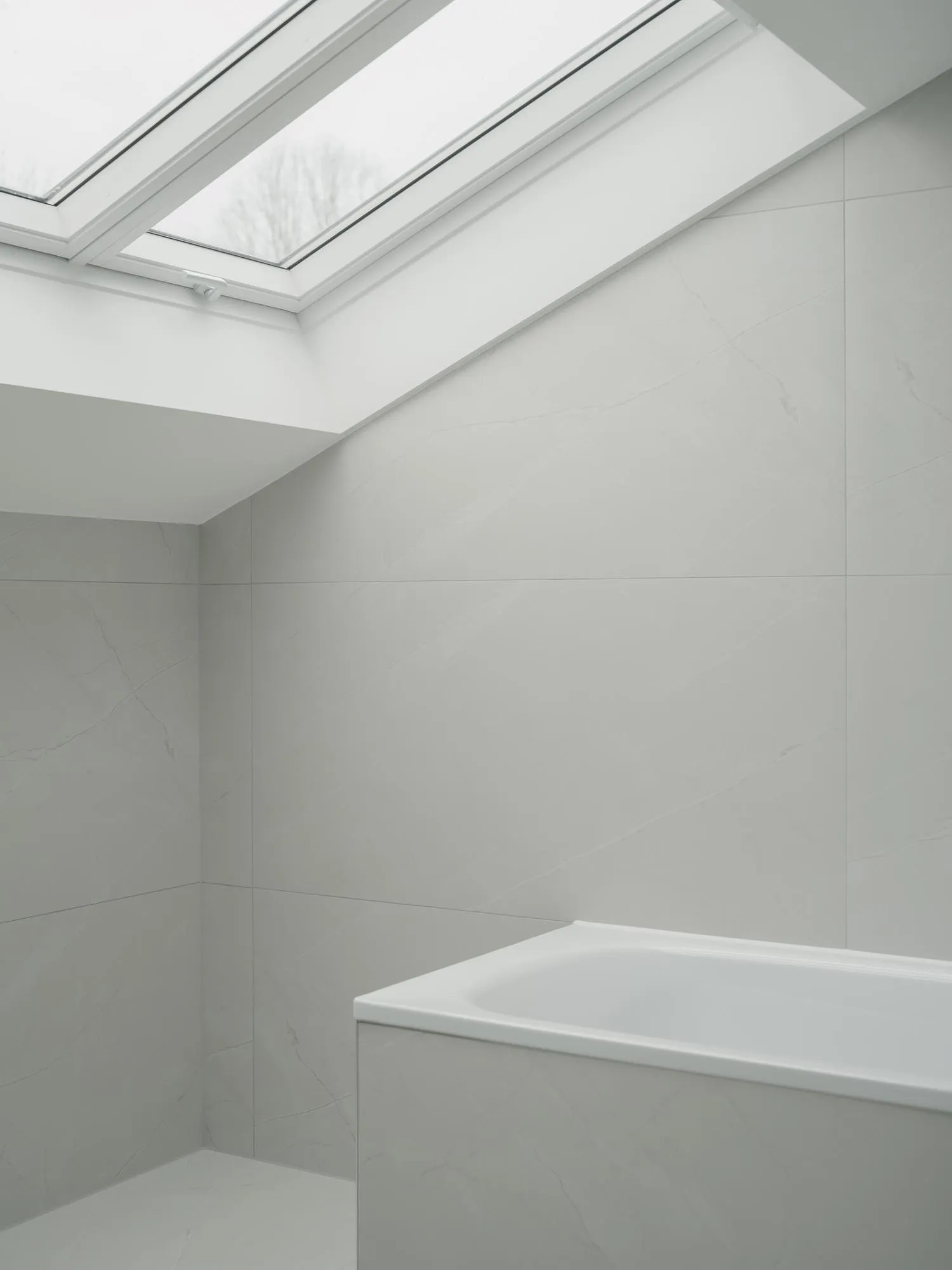 Internal photo showing an upper floor bathroom. By Office S&M, RIBA Chartered Architectural Practice in London.
