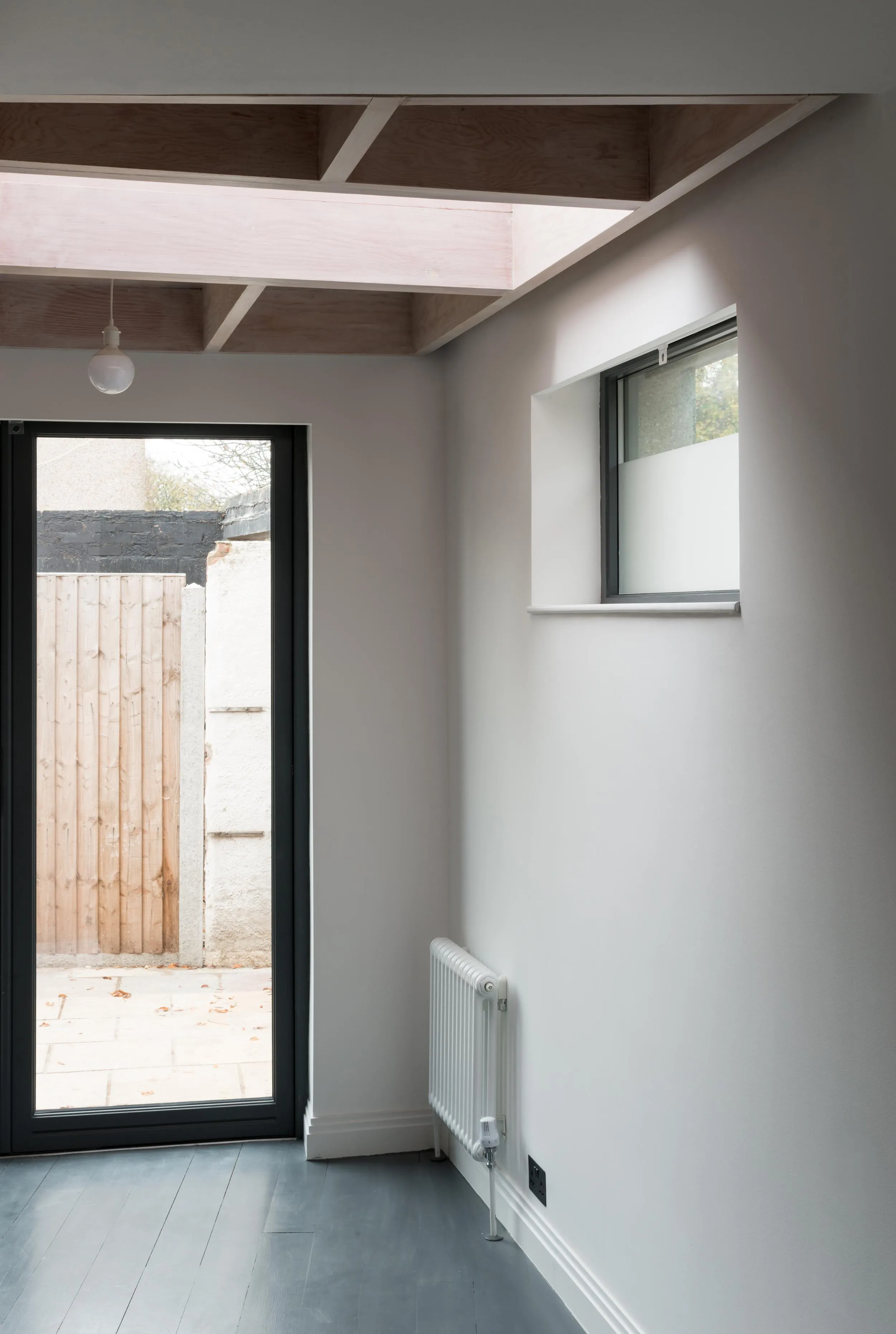 Internal photo showing the light coming through a roof light. By Office S&M, RIBA Chartered Architectural Practice in London.