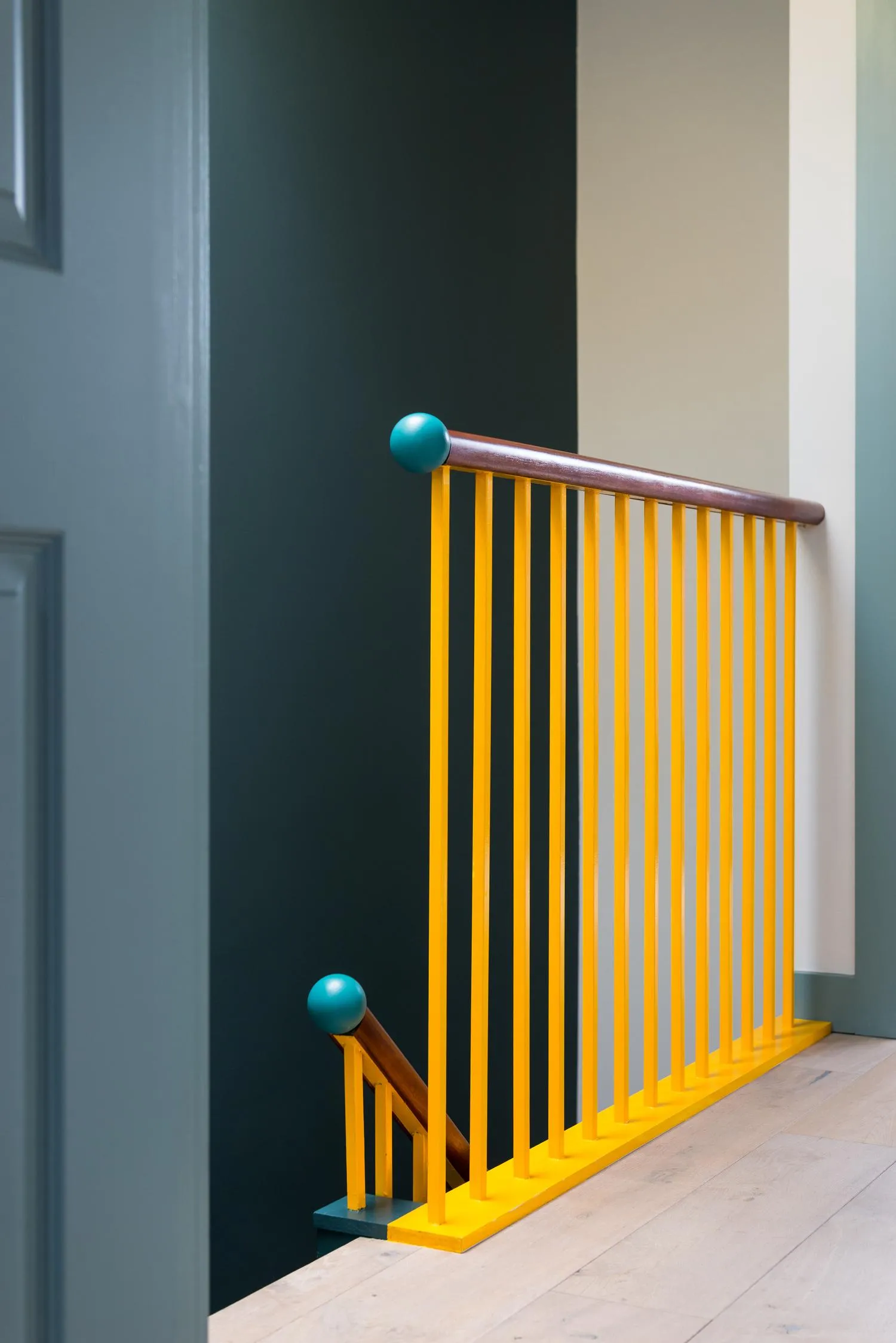 Zoomed in detail photo of the balustrade on upper floor. By Office S&M, RIBA Chartered Architectural Practice in London.