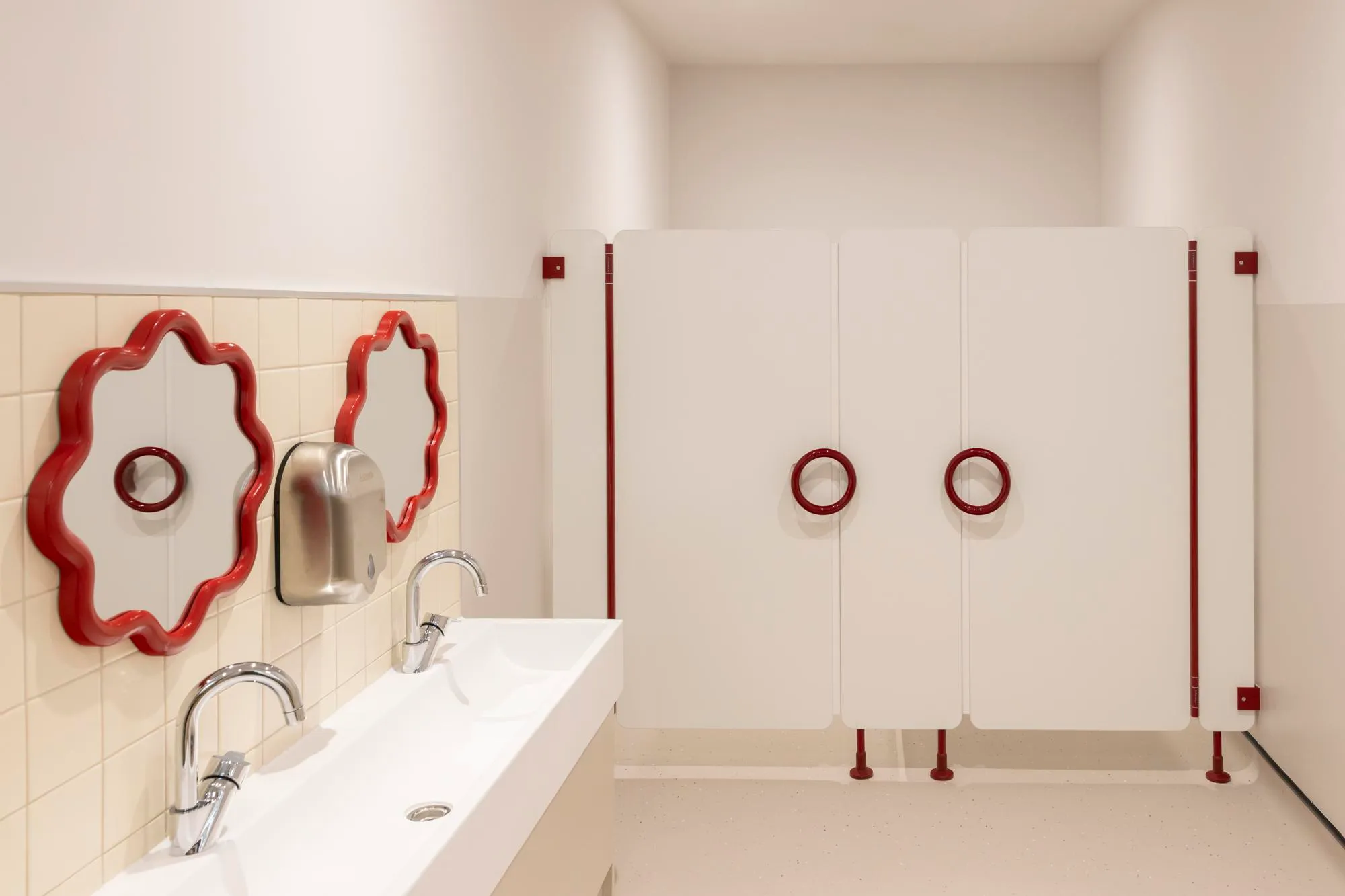 Bathroom stalls in the nursery. By Office S&M, RIBA Chartered Architectural Practice in London.