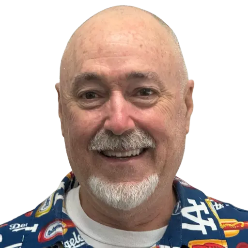 A professional headshot of Bill Paxson.