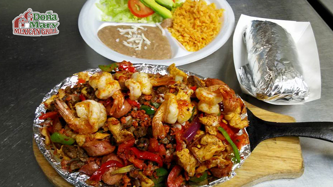 A plate of food with a fork and knife on it.