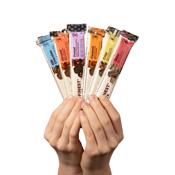 Hands holding 6 WFC chocolate bars.