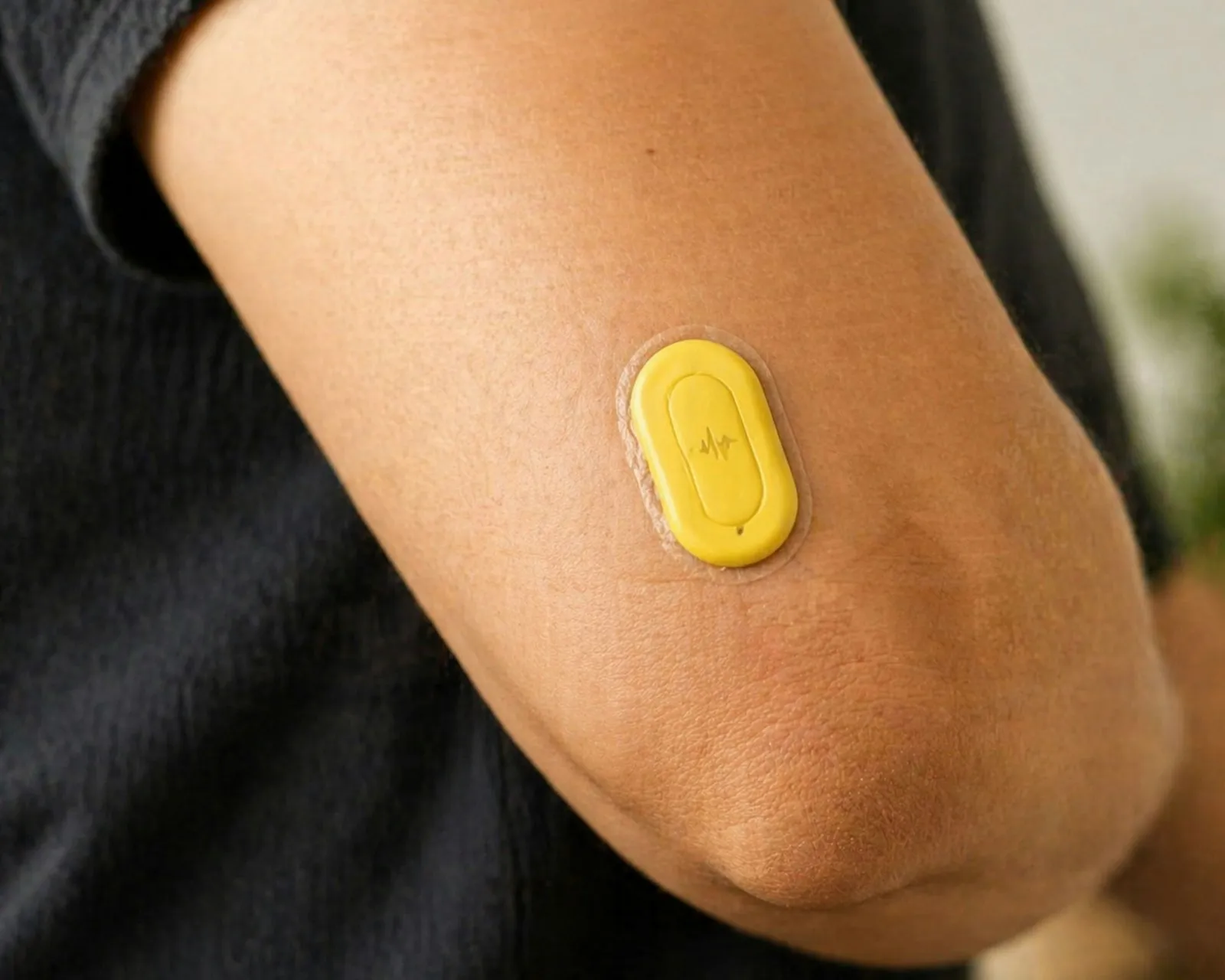 Adult wearing a wear-and-go peptide patch on their upper arm