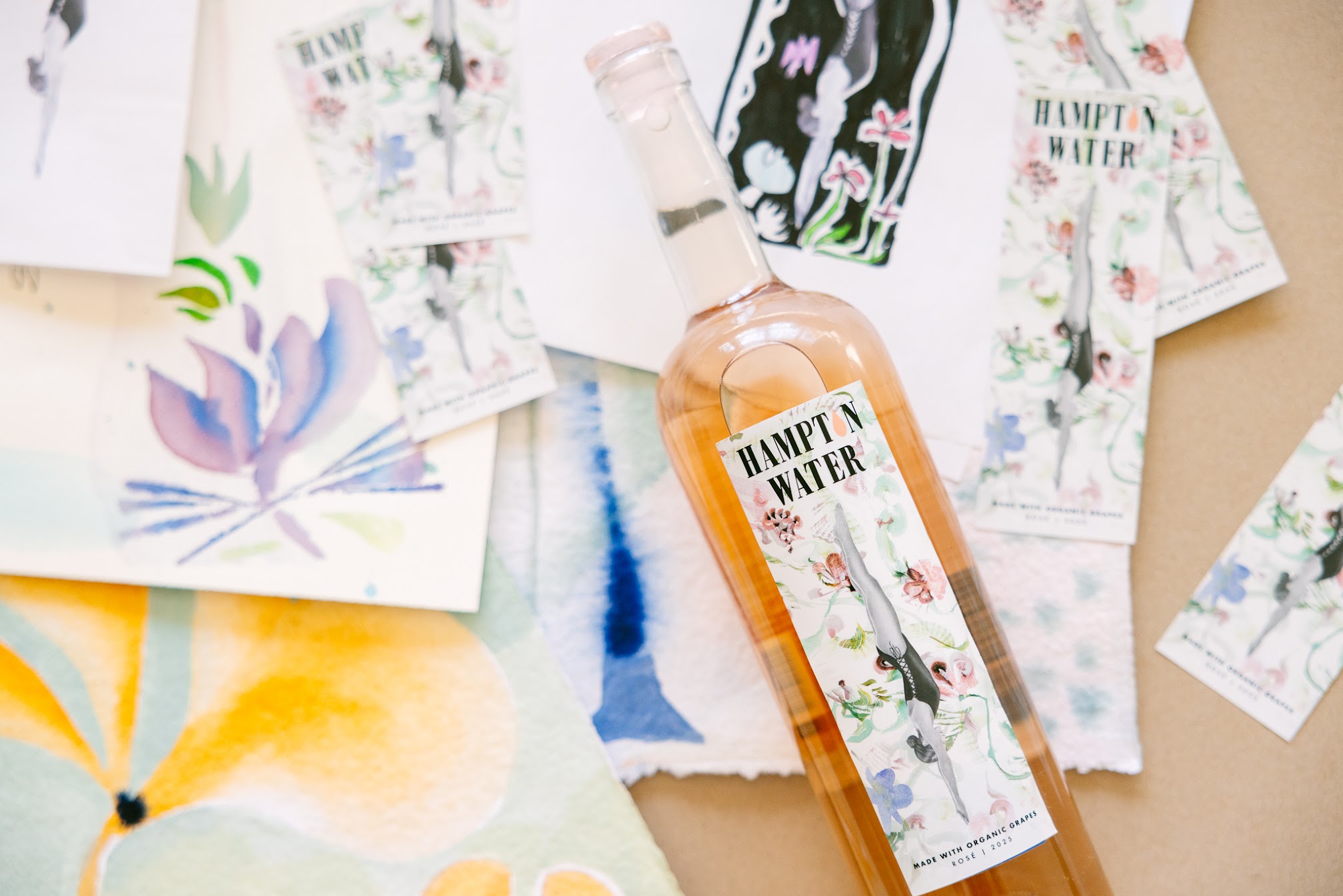 Toast to summertime with Hampton Water’s new floral Artist Series Bottle 