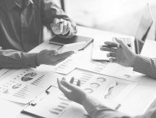 Business litigation two peope sitting at a table looking over documents