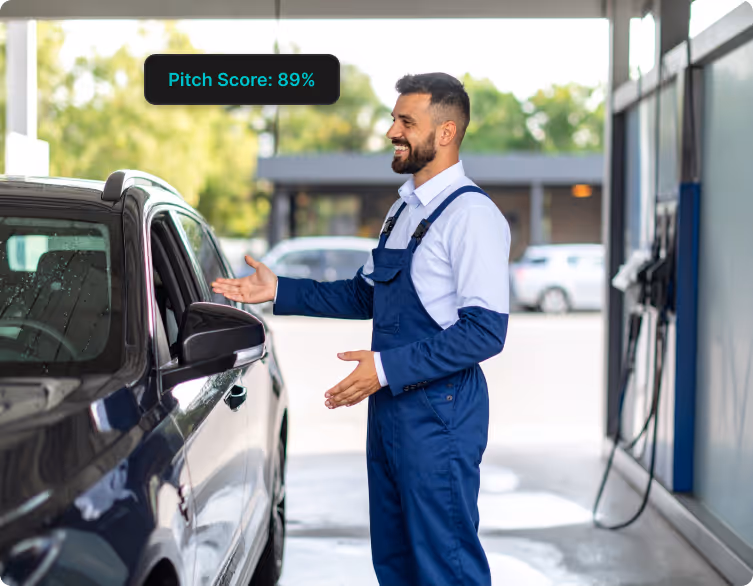 A car wash employee receiving a pitch score based on his conversation with customer.