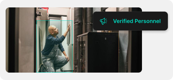 AI security system detecting PPE violations in a factory with real-time alerts for missing hard hats and safety vests