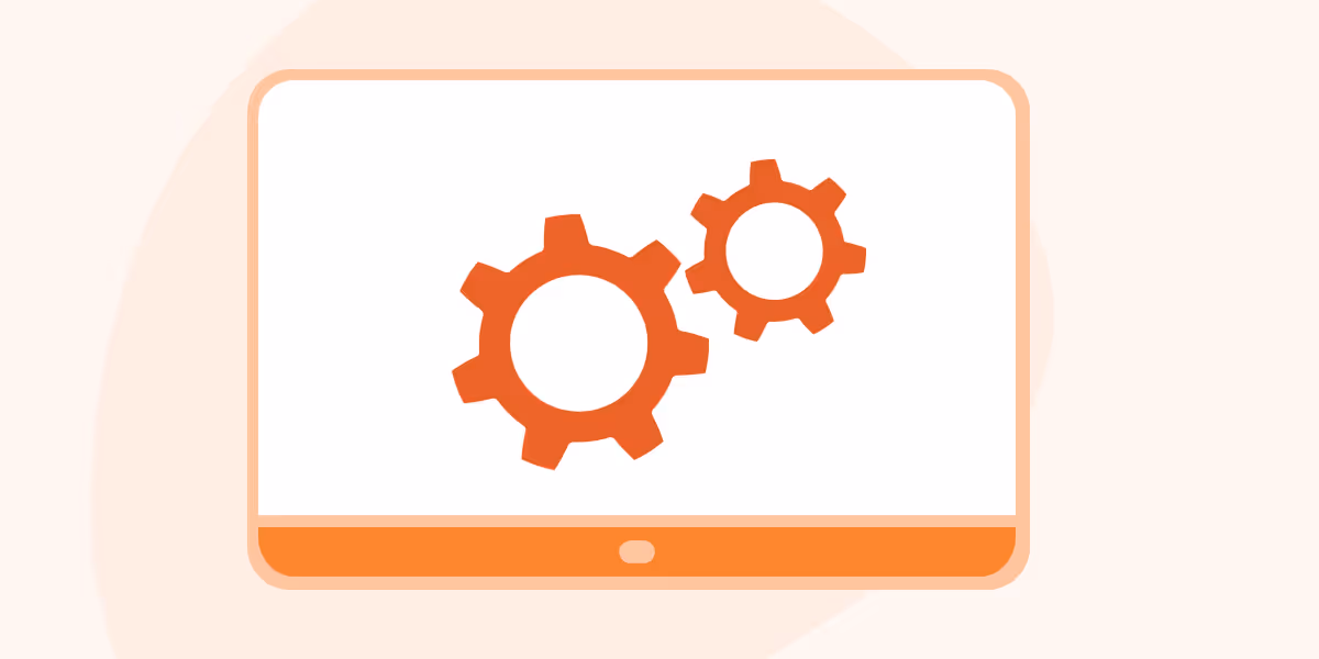Illustration of a computer monitor with two interlocking orange gears on the screen.