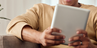 Person using a tablet at home