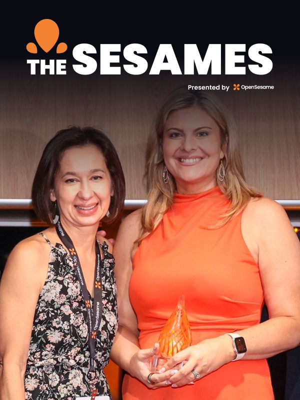 A winner from the 2026 Sesames ceremony smiles with their trophy in hand