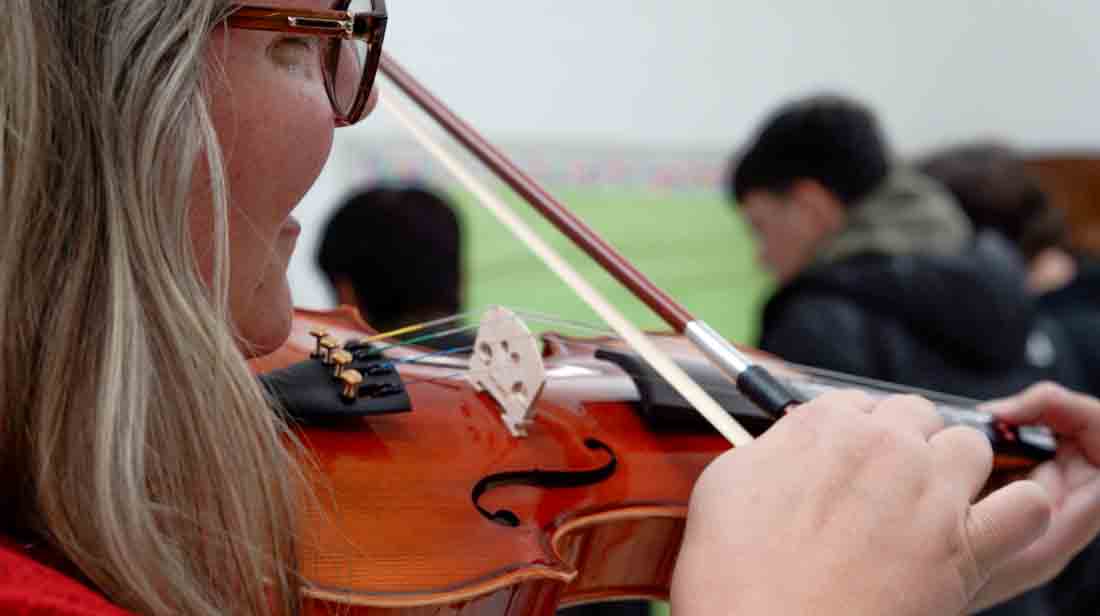 Recording while teacher shows how to play an instrument