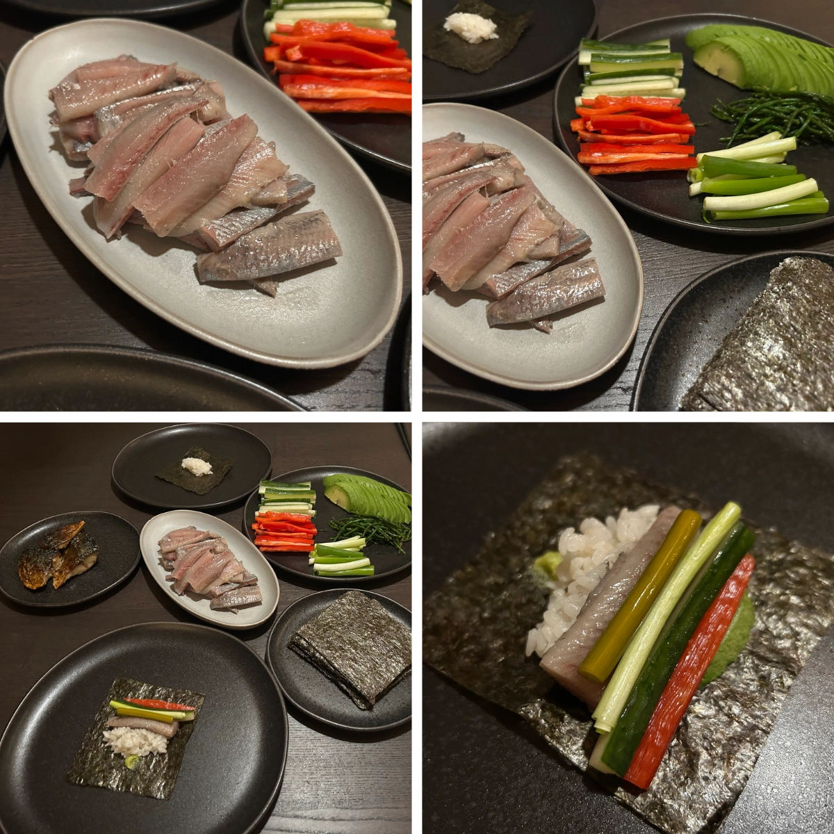 Home table spread with sliced fish, rice, seaweed sheets, and neatly cut vegetables, assembled by hand into small seaweed wraps.
