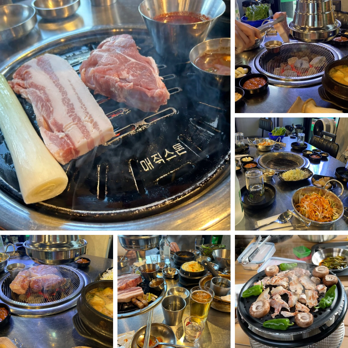 Slices of pork belly and vegetables grilling on a tabletop charcoal grill, surrounded by metal bowls, side dishes, and drinks in a Korean restaurant.