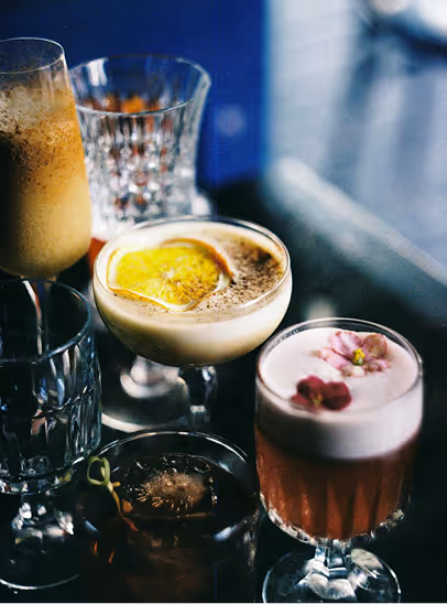 Signature cocktails at the bar of the Grand Hotel de Courtoisville in Saint-Malo, a luxury 4-star spa hotel in Brittany, specializing in mixology.