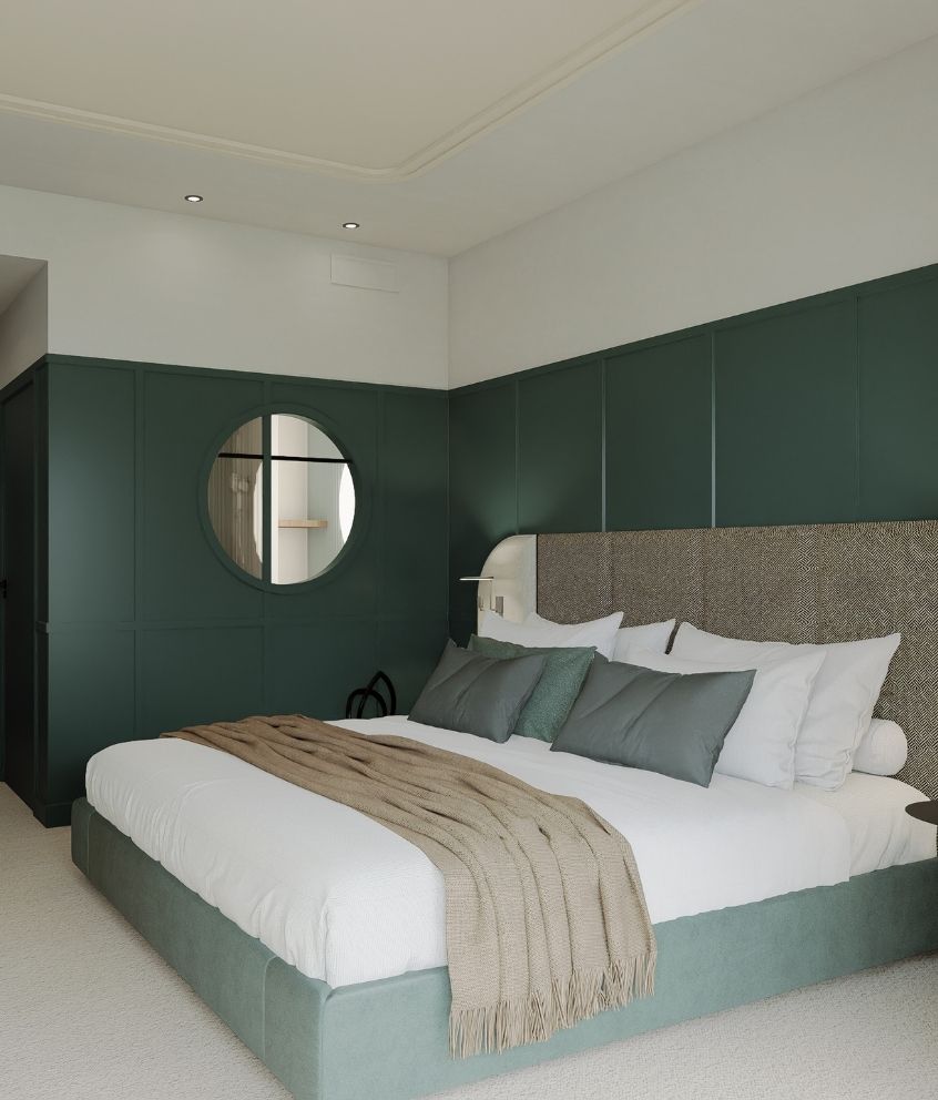 Lit double spacieux dans une chambre supérieure du Grand Hôtel de Courtoisville, hôtel 4 étoiles à Saint-Malo.