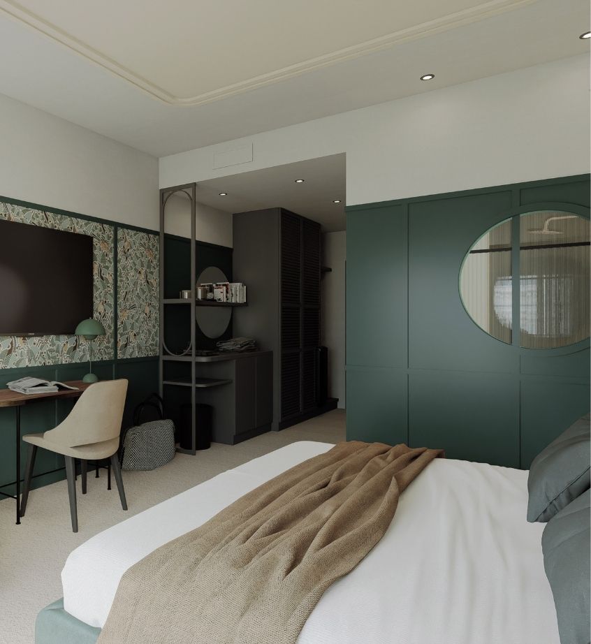 King-size bed in a Deluxe room at the Grand Hotel de Courtoisville, for a luxury stay in Saint-Malo.