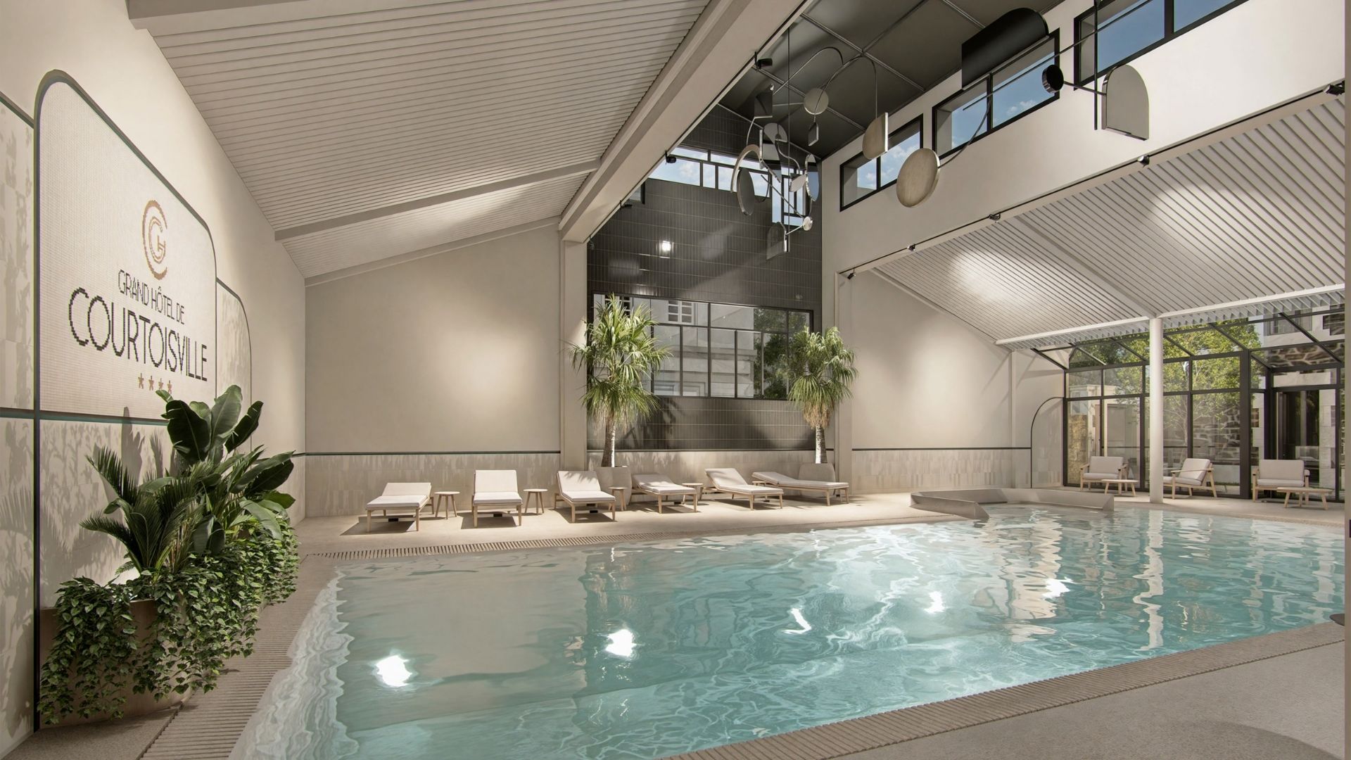 Piscine intérieure élégante au Grand Hôtel de Courtoisville à Saint-Malo, hôtel spa 4 étoiles de luxe en bord de mer.